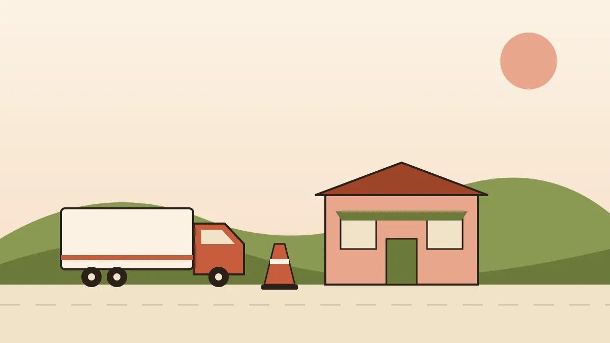 Restaurant de bord de route avec un camion garé sur une place réservée marquée au sol et un cône orange devant l'entrée